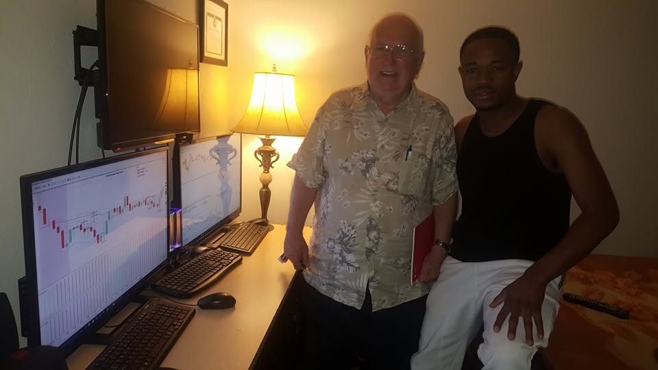 Quinten and Dr. DVD studying charts together
